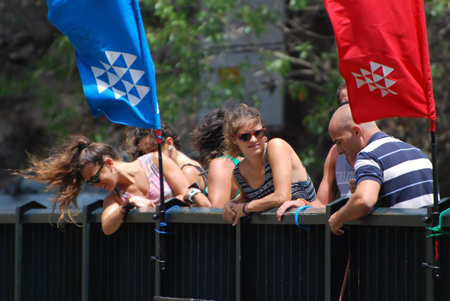 spectators on the bridge waiting for their turn to jump